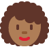 woman: medium dark skin tone, curly hair