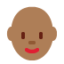 woman: medium dark skin tone, bald