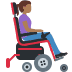 woman in motorized wheelchair: medium dark skin tone, facing right
