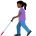 woman with white cane: dark skin tone