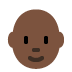 person: dark skin tone, bald